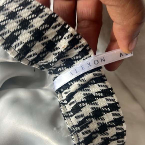 This fantastic houndstooth skirt can be in your closet today. - Picture 4 of 4